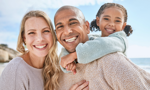 Smiling couple and child